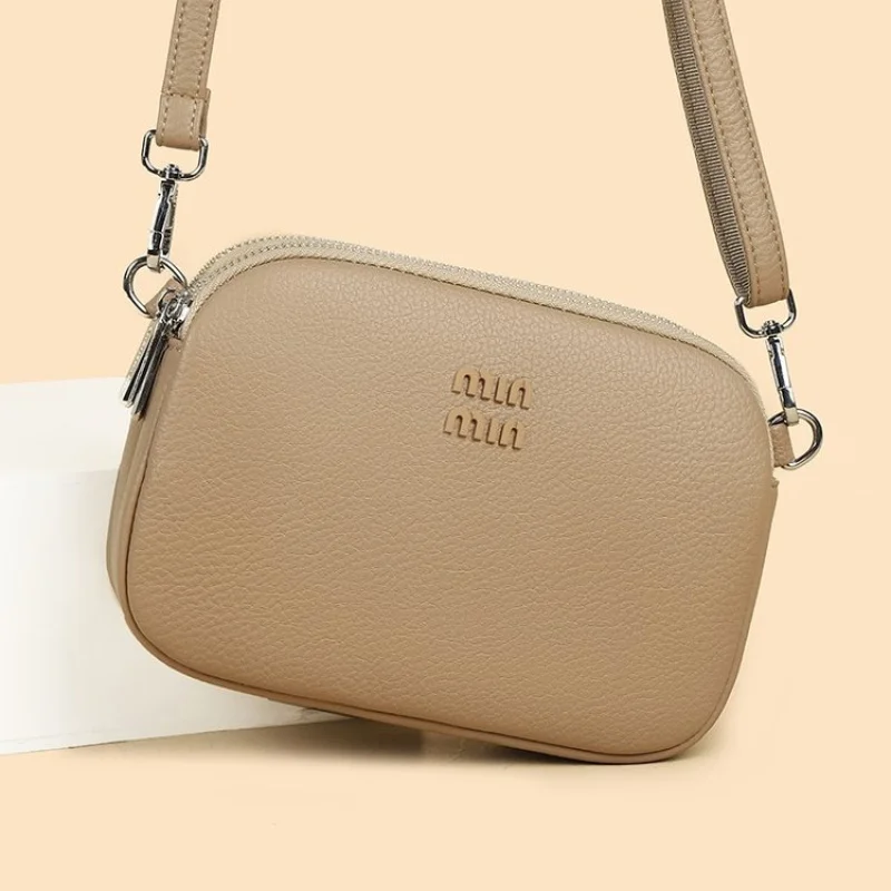 2025 nova bolsa de mão de couro feminina high-end marca de luxo famoso designer clássico simples paris chique estética ​