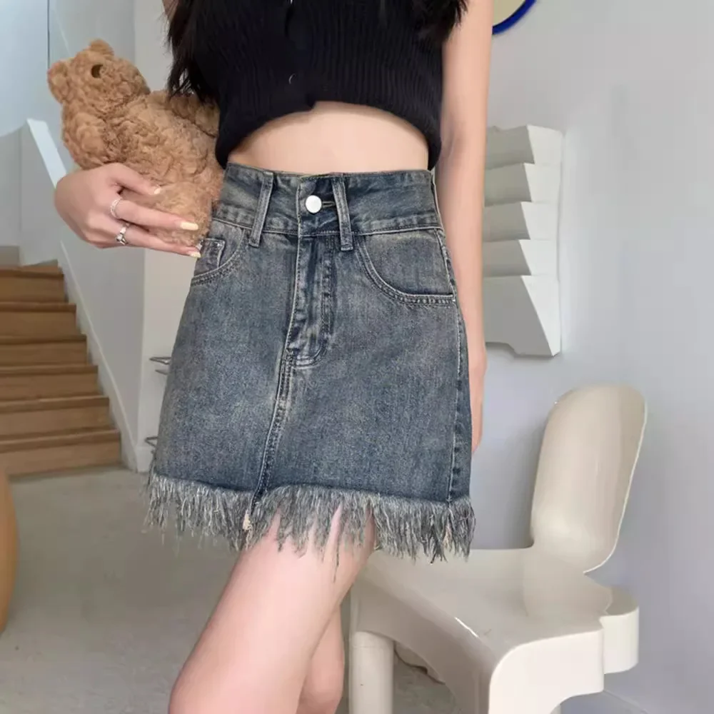 Retro denim skirt women's spring new design sense high waist and thin fringed A word hip wrap short skirt