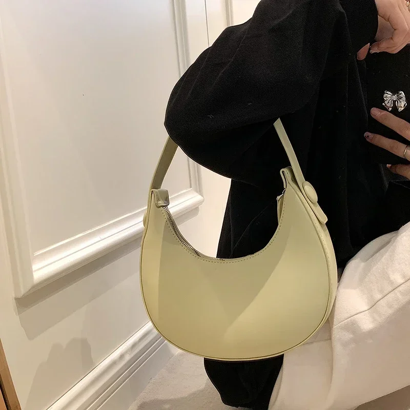 Bolsa de ombro PU monocromática feminina, com zíper, Half Moon, bolsas de mão simples e versáteis, venda quente, moda, 2024