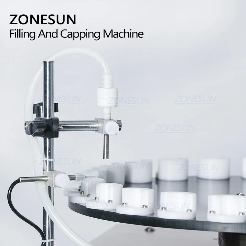 Zonesun 2 em 1 mesa rotativa automática de óleo essencial pequeno reagente frasco de vidro máquina de enchimento e tampagem de garrafas líquidas