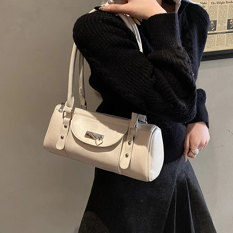 Niche high-value portable bowling bag women's fashion simple foreign style Spice girl shoulder bag