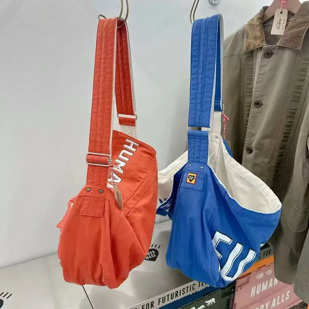

2025 HUMAN MADE Unisex Couple Small Double Sided Letter Canvas Durable Casual Daily Mail Messenger Bag