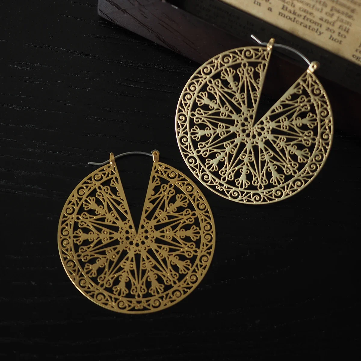 

Niche brand Greek designer original hollow round retro pattern earrings flake personality European and American style