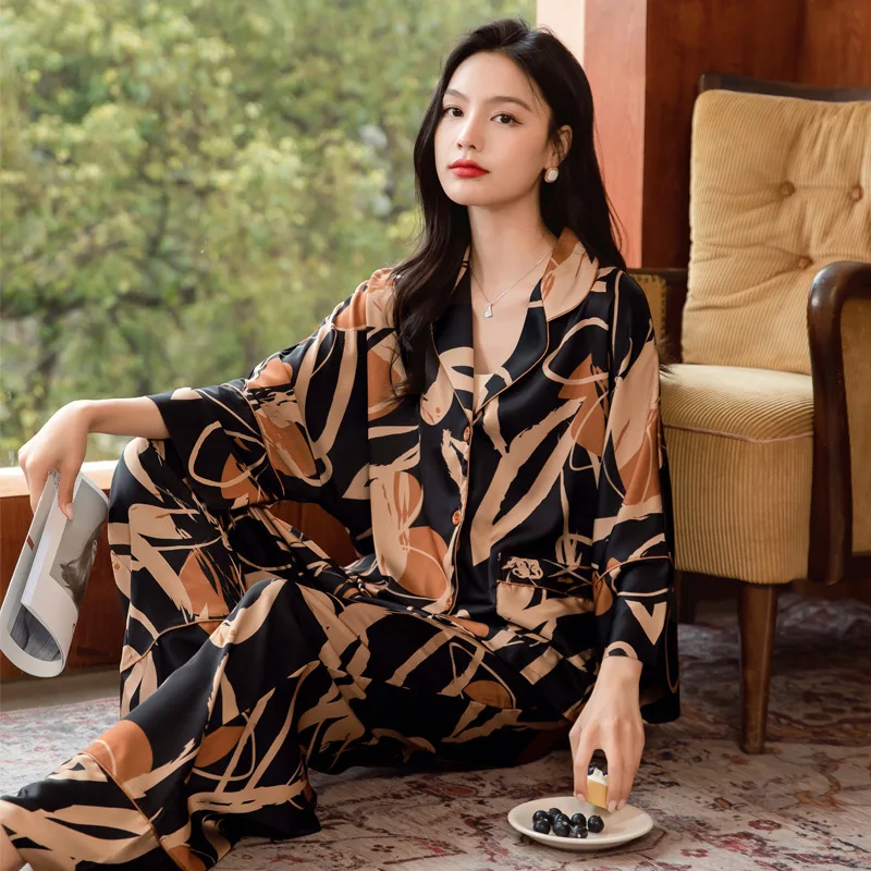 Conjunto de pijama de seda de hielo de primera calidad para mujer, ropa de descanso ligera de manga larga, diseño de seda de moda, comodidad lujosa para ropa de hogar
