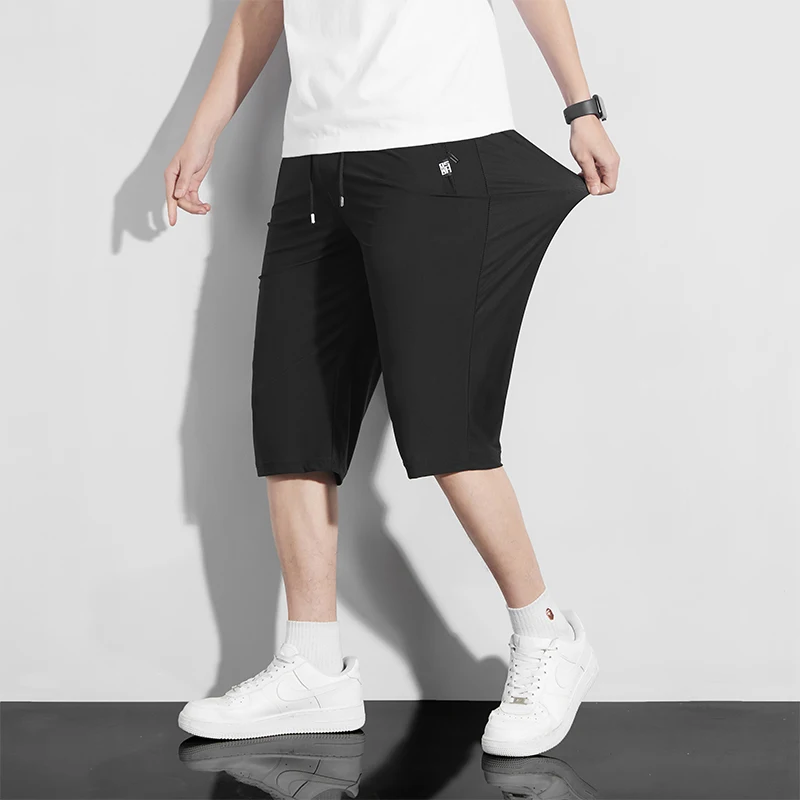 Top Quality Cool Ice Silk Waterproof Quick Dry New Summer Brand Casual Fashion Calf-Length Pants Trousers Mens Clothing