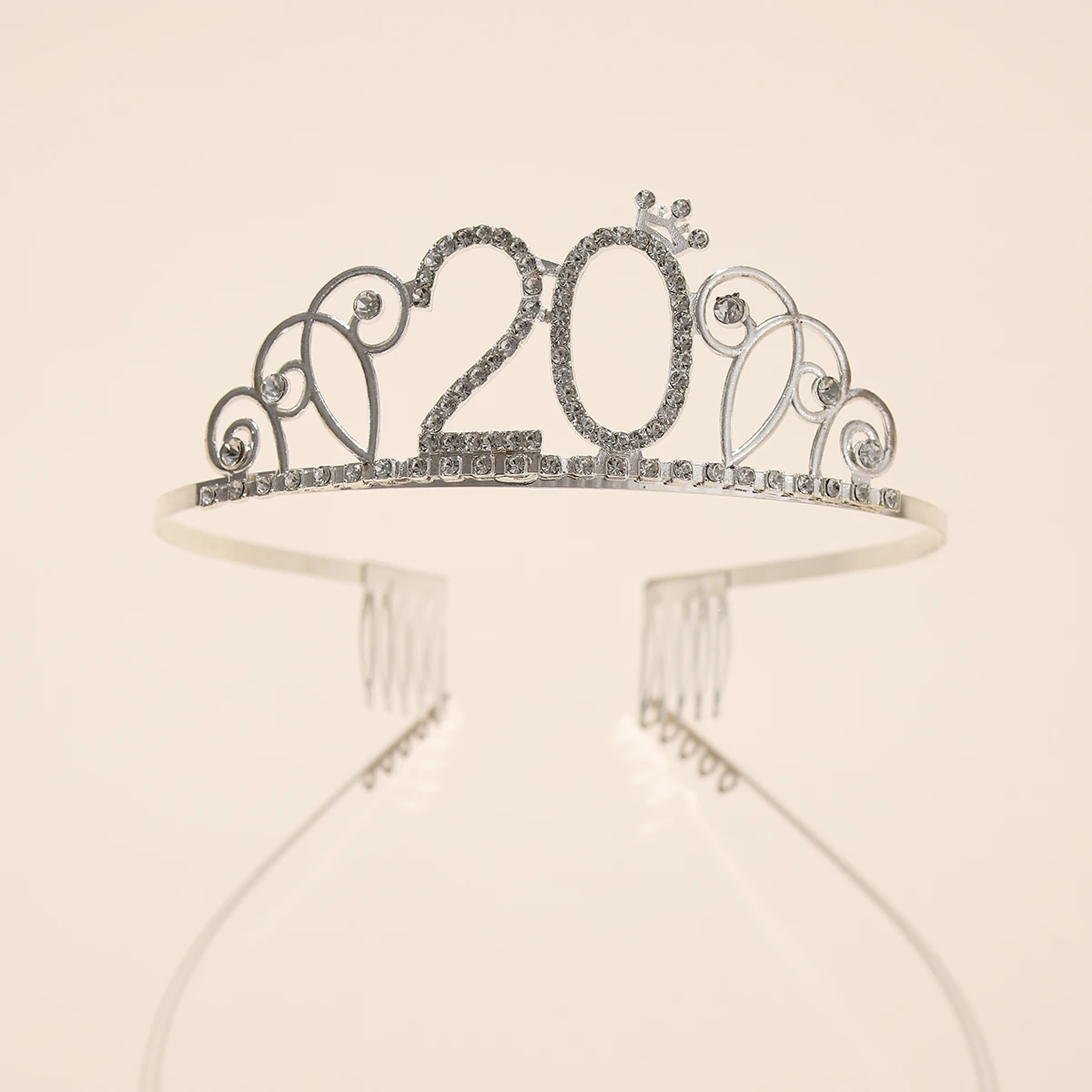 A classic 20 years old birthday themed digital crown paired with ribbons suitable for birthday event accessories