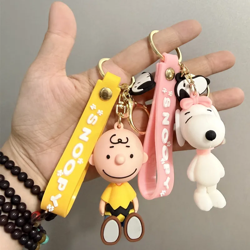 Cute and stylish new Snoopy cartoon dog design for 2026, can be used as a bag charm, backpack pendant, or car keychain. - view 4