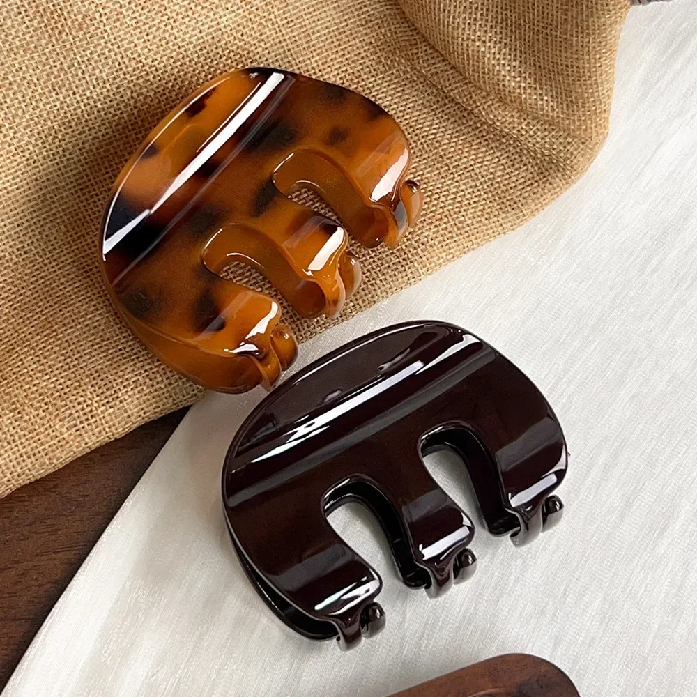 1pc Semplice Moda di medie dimensioni Artiglio dei capelli Zucca Grab Clip Versatile Shark Clip Tornante Nuovo Mezza cravatta Clip di capelli Ornamento di gioielli