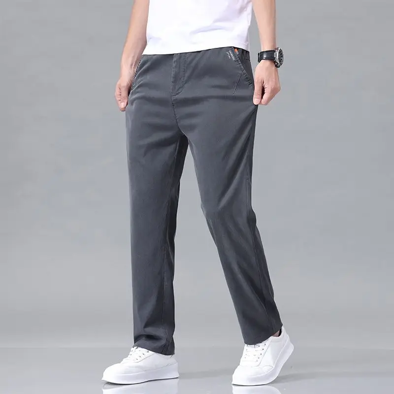 Nuevos pantalones informales de tela Lyocell para primavera y otoño para hombre, pantalones de negocios ajustados a la moda de alta calidad, pantalones suaves elásticos de marca