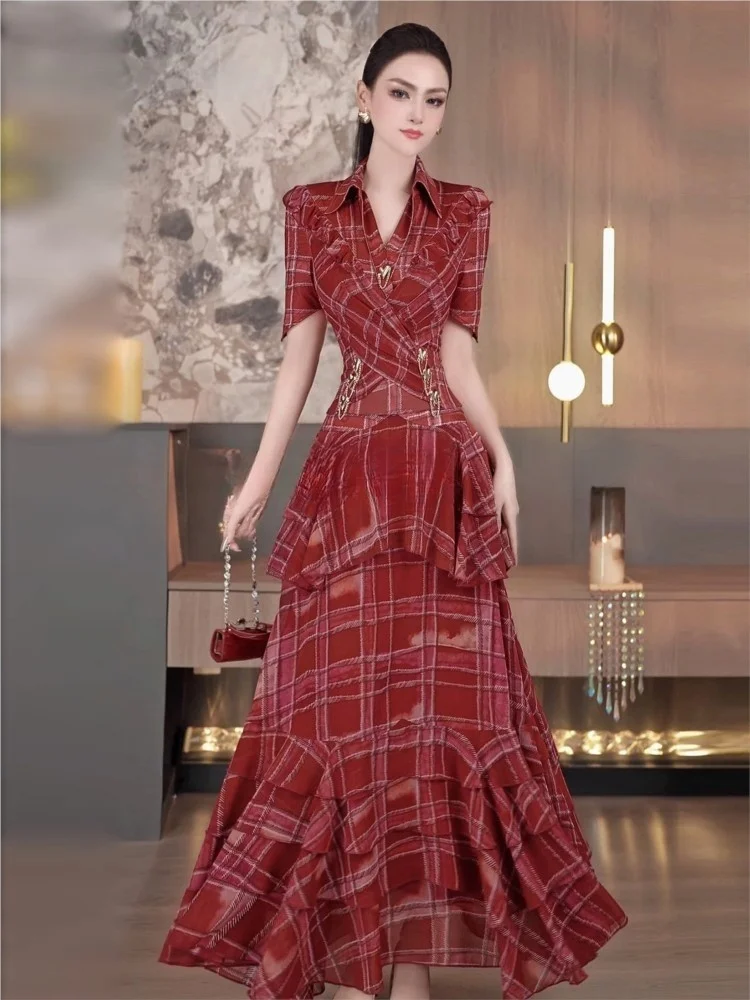 A new youthful set of two-piece plaid pleated shirt and irregular ruffled skirt