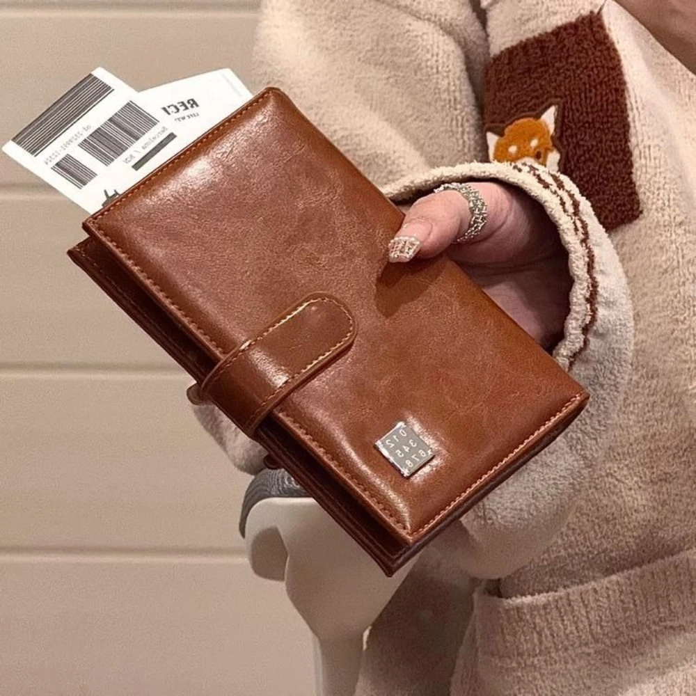 女性のレザーパスポートホルダー財布女性の ID バッグバックルカードホルダー小銭入れ印刷クラッチレザーパスポートホルダー