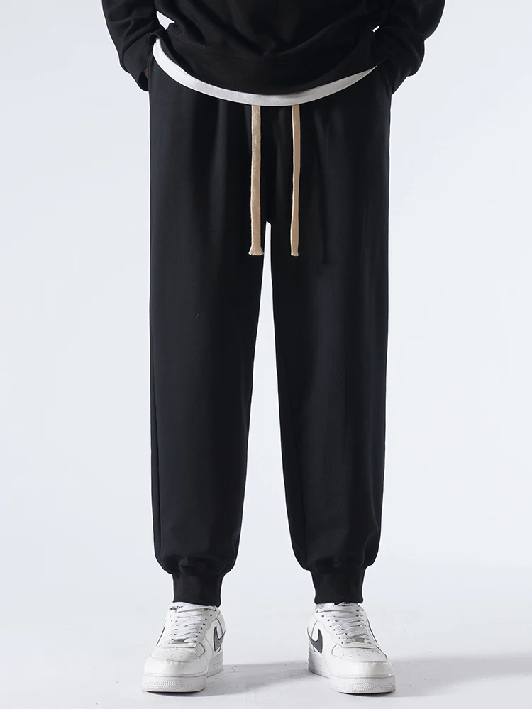 

Men's loose sports pants for autumn casual new style age reducing fashion drawstring solid color, versatile