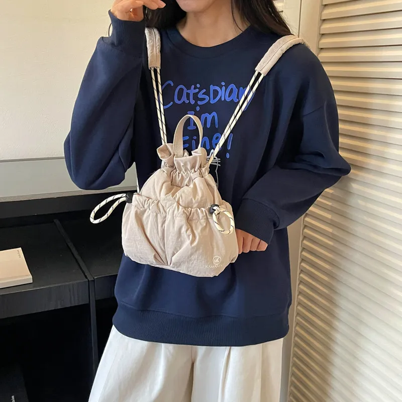 Mini drawstring backpack for women, Korean style, lightweight, casual, sporty, versatile, suitable for commuting and travel