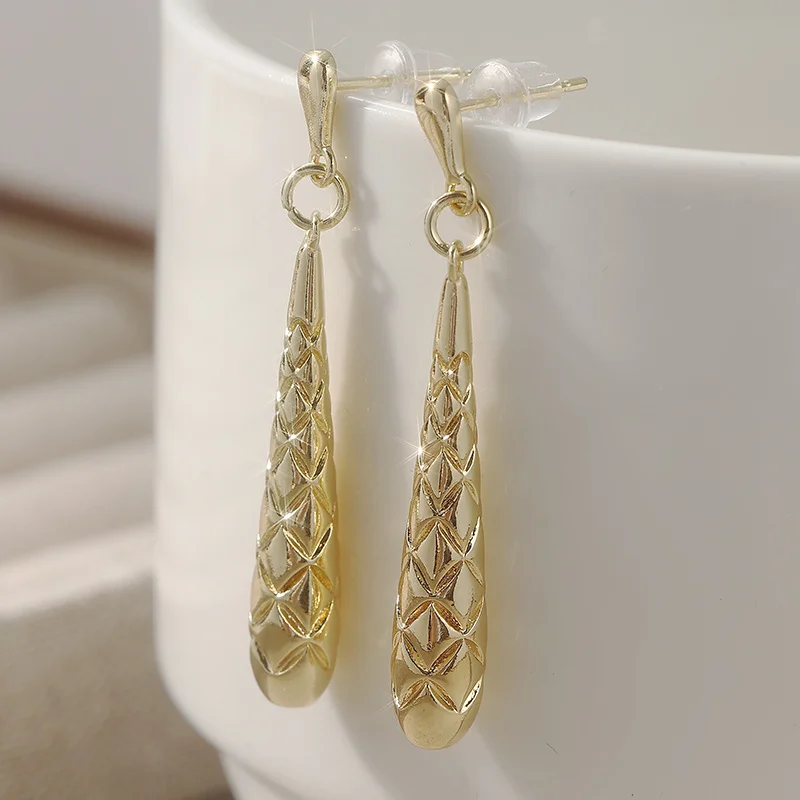 Retro golden torpedo drop earrings and brushed clown design mid-century - beautiful gold pendant earrings