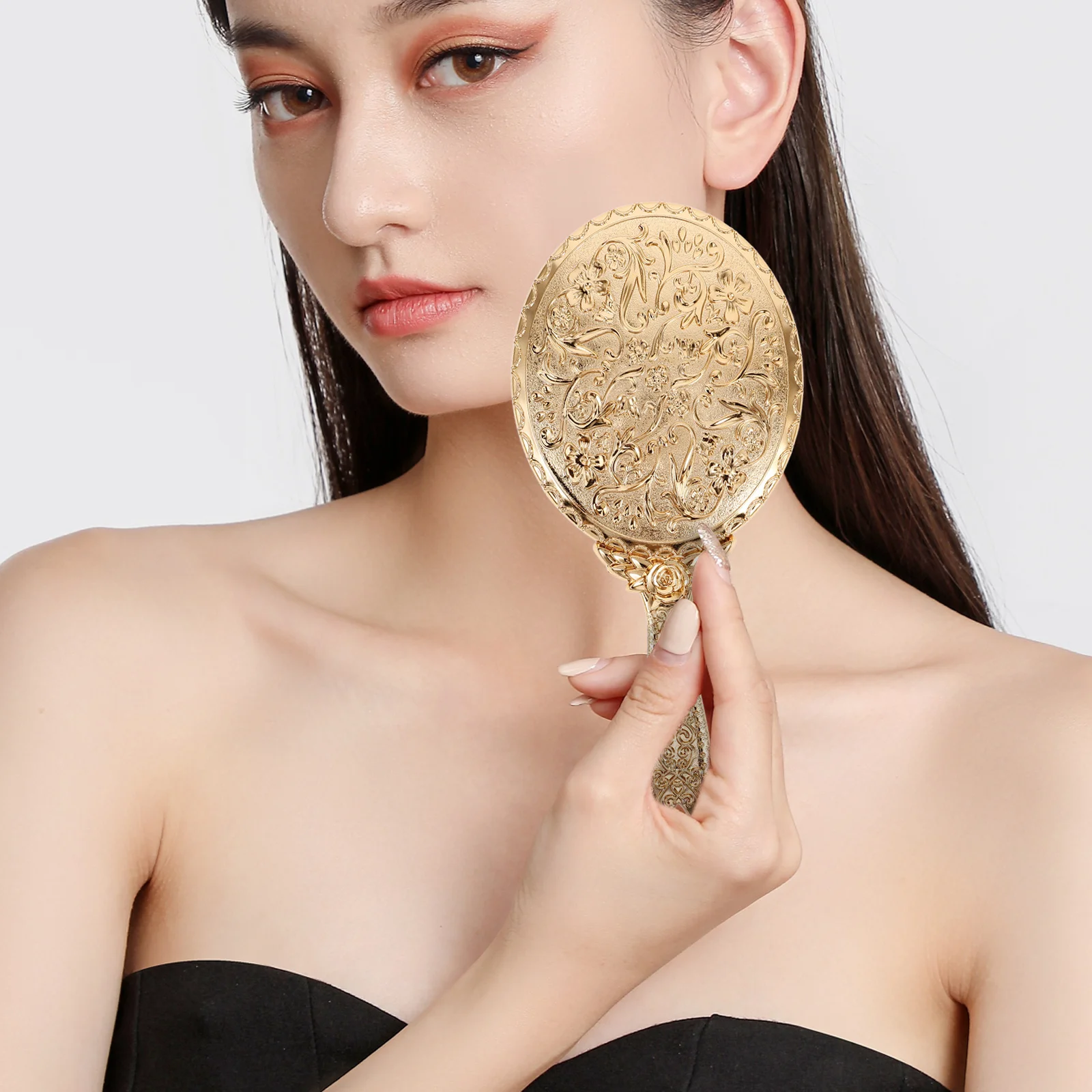 

1Pcs Portable Rose Gold Carved Retro Handheld Mirror Oval Shaped Makeup Mirror for Travel Outdoor Use