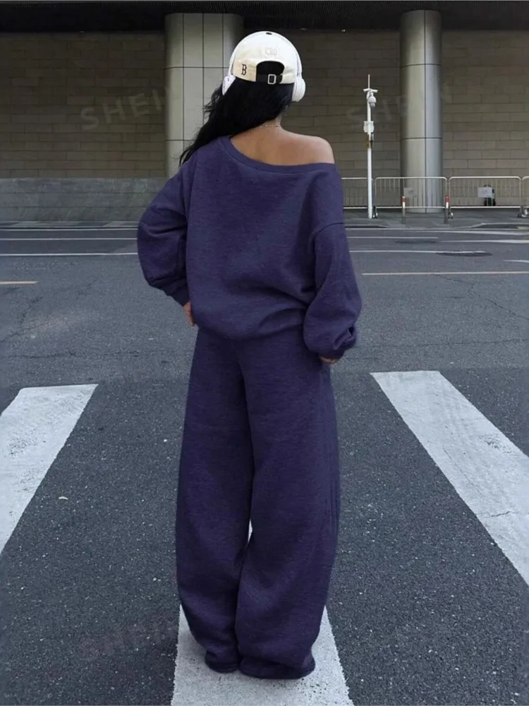 ชุดกางเกงสีพื้นสำหรับผู้หญิง ฤดูใบไม้ร่วงและฤดูหนาว สไตล์ลำลองแบบสปอร์ต เสื้อคอกลมทรงหลวม กางเกงขายาวทรงกว้าง ชุดสองชิ้น