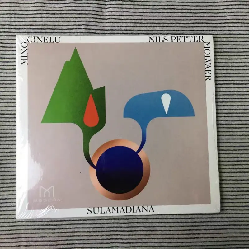 

CDMino Cinelu•Nils Petter Molvaer–SulaMadiana,2020 Modern Recordings,Jazz/Ambient/World Music, Ribute To Manu Dibango&Tony Allen
