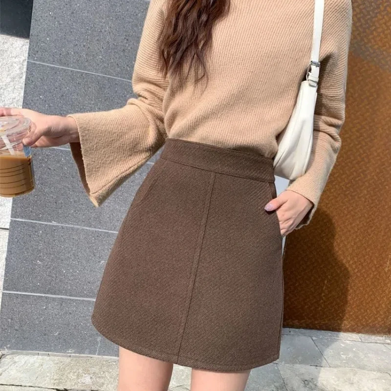 

Простая офисная женская осенне-зимняя шерстяная женская утолщенная однотонная юбка трапециевидной формы с карманом на молнии, винтажная модная короткая тонкая юбка трапециевидной формы с высокой талией