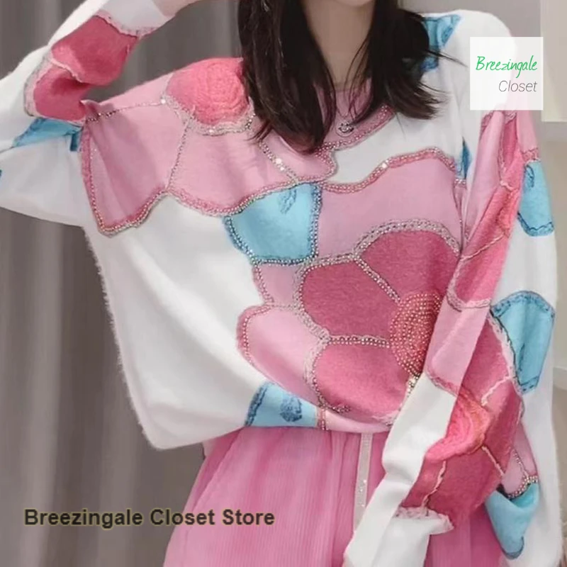 

Korean-style Western-style printed rhinestone sweater women's spring and autumn new design sense long loose mink velvet top.