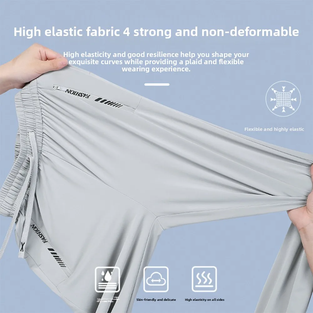 ملابس رياضية سراويل رياضية من الحرير الجليدي فضفاضة بجيب بسحاب سراويل للجري قابلة للتمدد وقابلة للتنفس سراويل لياقة بدنية