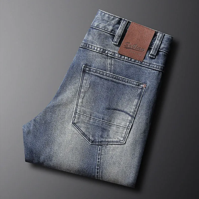 Jeans da uomo di alta moda di strada retrò lavati blu elasticizzati Slim Fit impiombati Jeans da motociclista firmati Homme pantaloni in Denim Hip Hop Patched