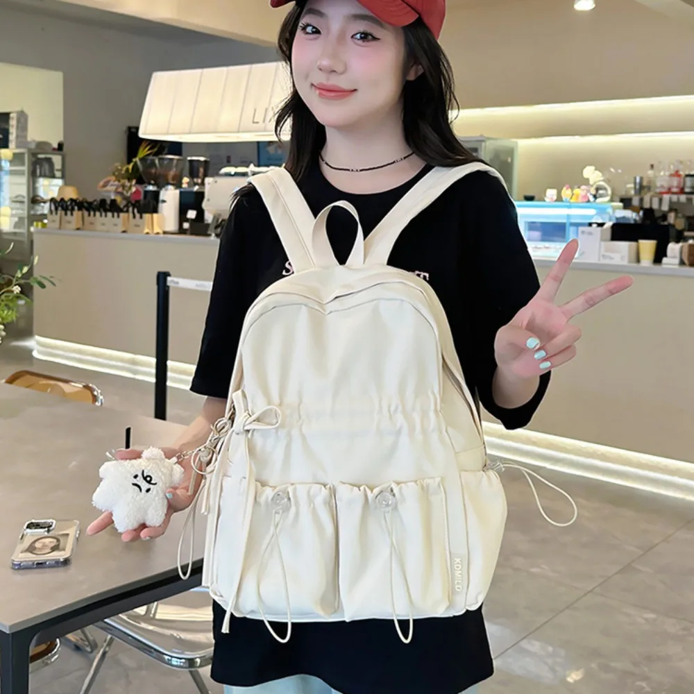 ใหม่กันน้ําเด็กโรงเรียนกระเป๋าเป้สะพายหลังไนลอนความจุขนาดใหญ่นักเรียนกระเป๋านักเรียนน้ําหนักเบากวดวิชากระเป๋าโรงเรียนสํานักงาน