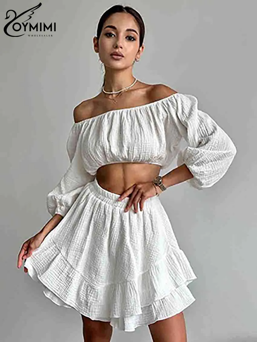 Oymimi Fashion White Cotton Women's Two Pieces Set Elegant Strapless Three Quarter Sleeve Crop Tops And Pleated Mini Skirts Sets