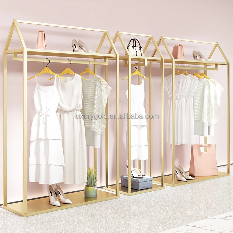 Custom. boutique garment shelf cloth display stands display clothes shops stainless steel metal clothing rack for st