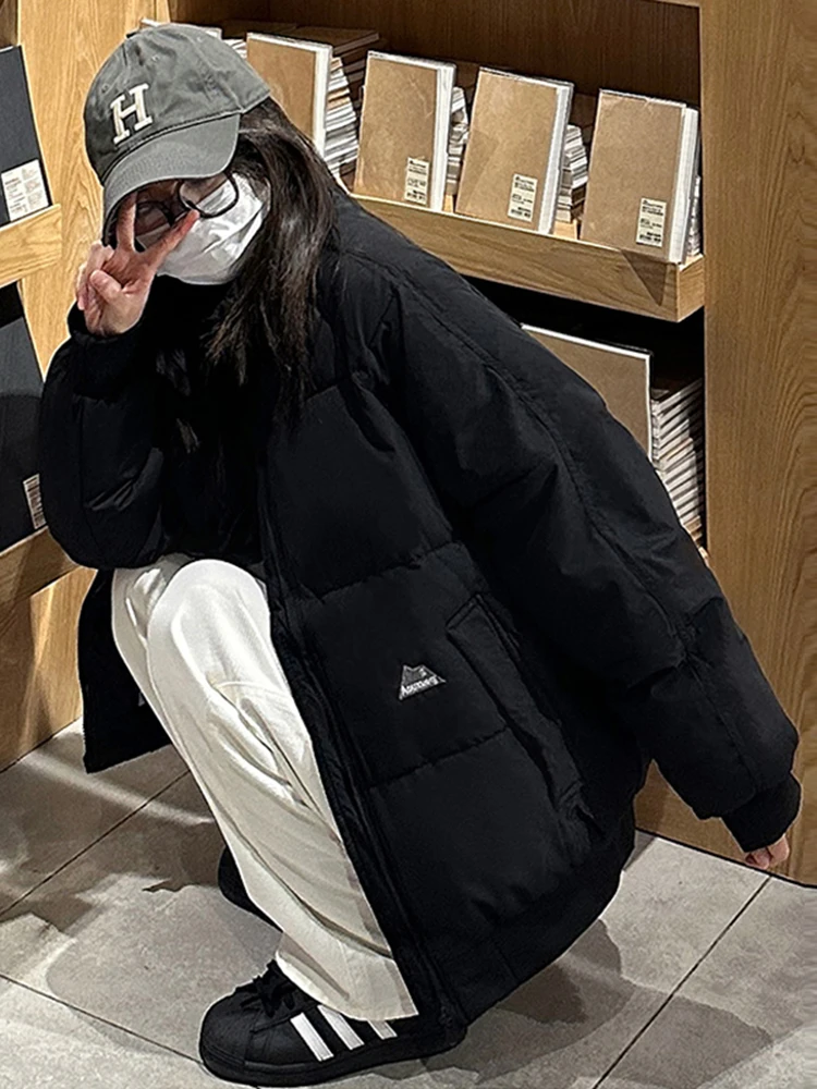 ملابس خارجية نسائية ذات لون نقي وياقة واقفة من القطن Jaet 2024 شتاء جديد فضفاض متعدد الاستخدامات ملابس خارجية صغيرة الحجم