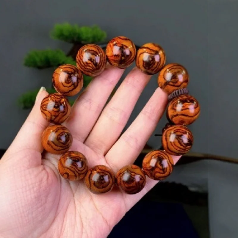 Authentic Butterfly Bracelet, Genuine Hainan Huanghuali Material, Ghost Face and Eye Pattern Tiger Ski