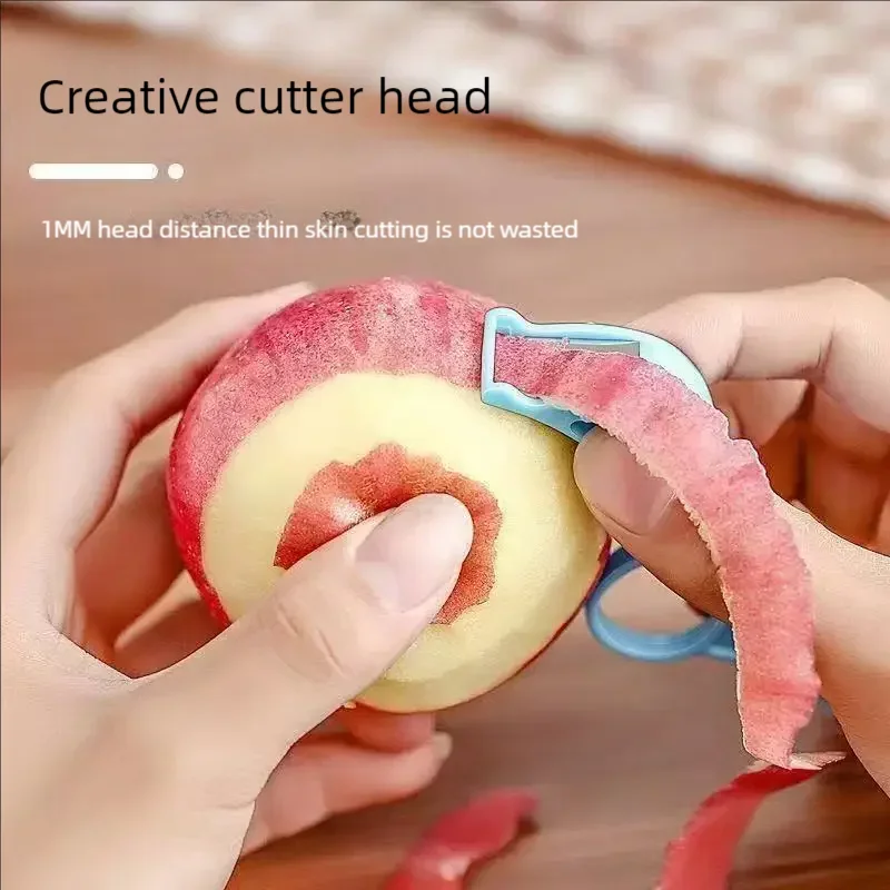 Fruit peeler for peeling oranges and apples. Hand-powered fruit peeling device