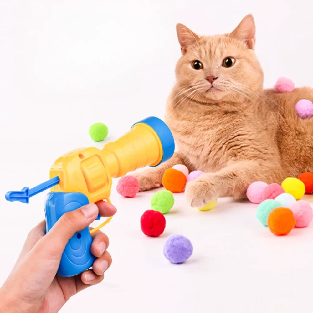 

Interactive Eco-Friendly Cat Ball Toy Launcher Plastic Plush Ball Shooting Gun with 30Pcs Pom Pom Balls