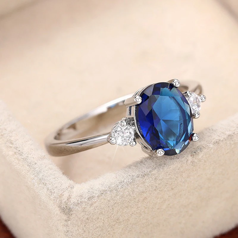 Huitan trend ige blaue Zirkonia Ringe für Frauen einfache elegante Finger Zubehör Hochzeits feier Jubiläum Geschenk Modeschmuck