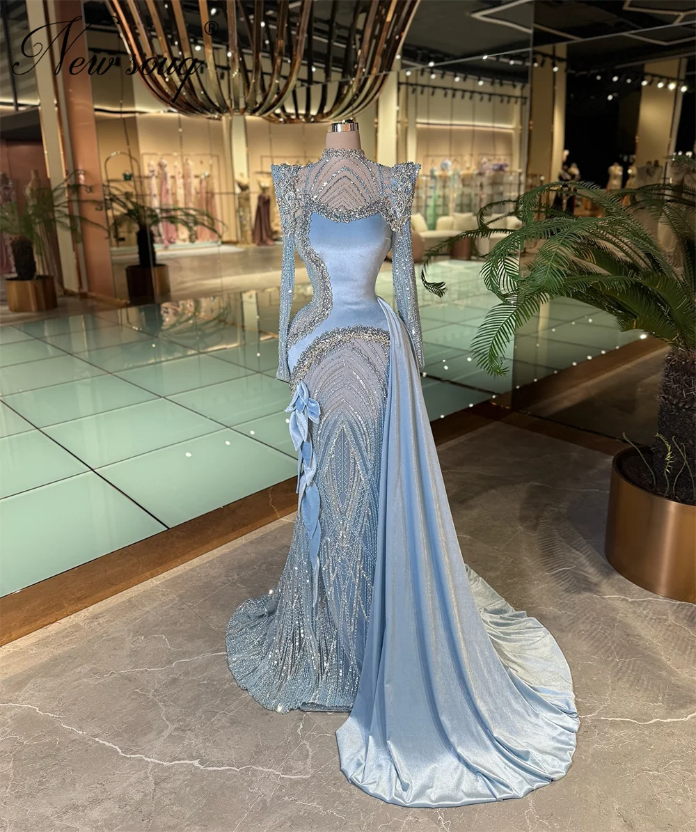 فساتين المشاهير بأكمام طويلة زرقاء مع ذيل شق أنيق مطرز بالكريستال للحفلات الراقصة للنساء فساتين سهرة مخصصة للحفلات