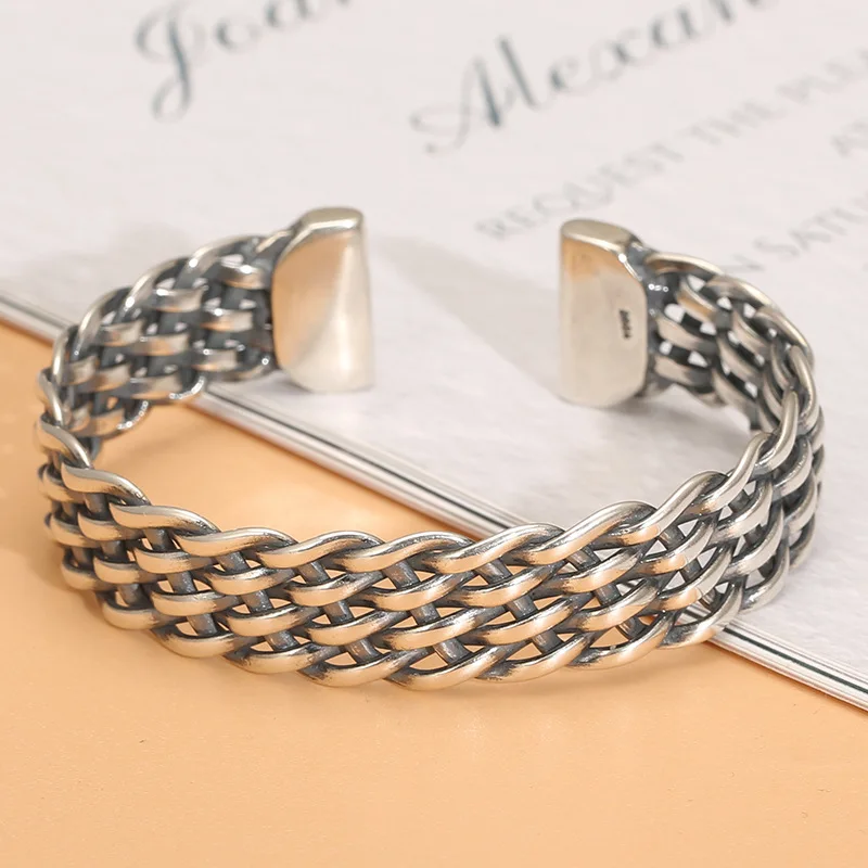 Wholesale S925 silver woven hollowed men's and women's wave pattern simple temperament Thai silver open-ended bracelet