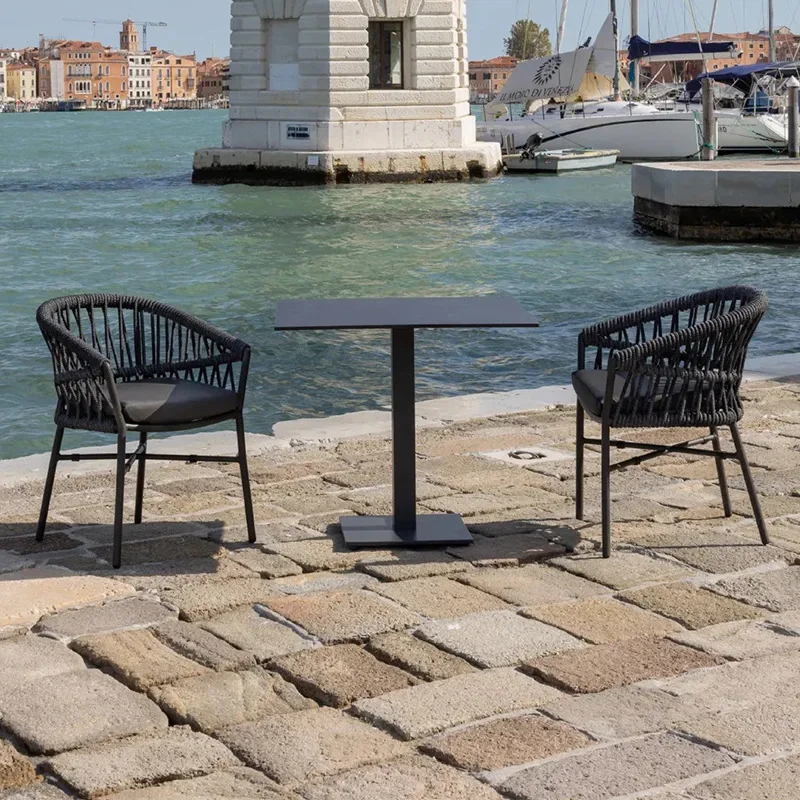 Outdoor rattan table and chair combination, waterproof and sunscreen leisure rattan chair three-piece set