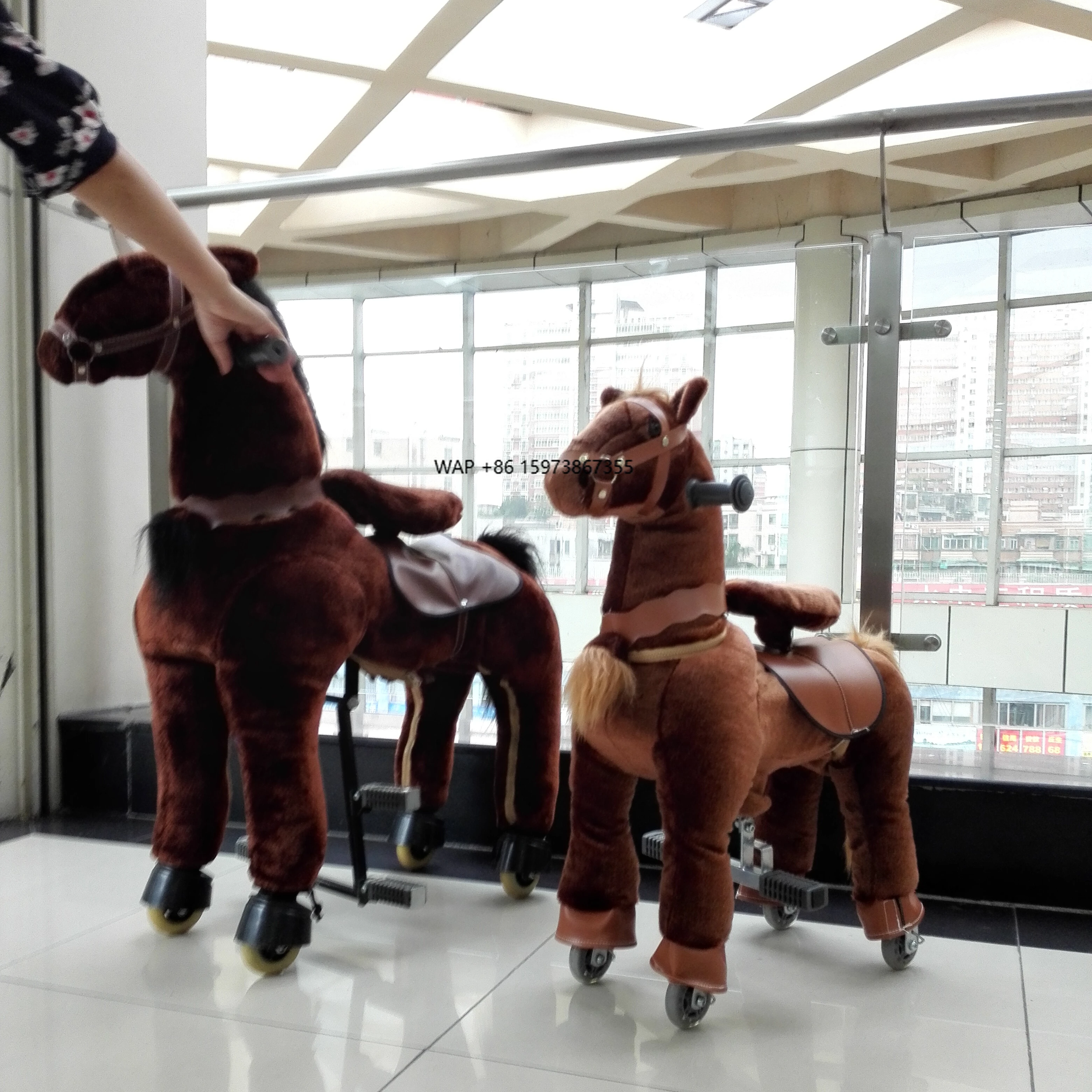 

Horse 132 cm large mechanical bounce up and down mobile riding toy life size Guangzhou adult mechanical horse fitness machine