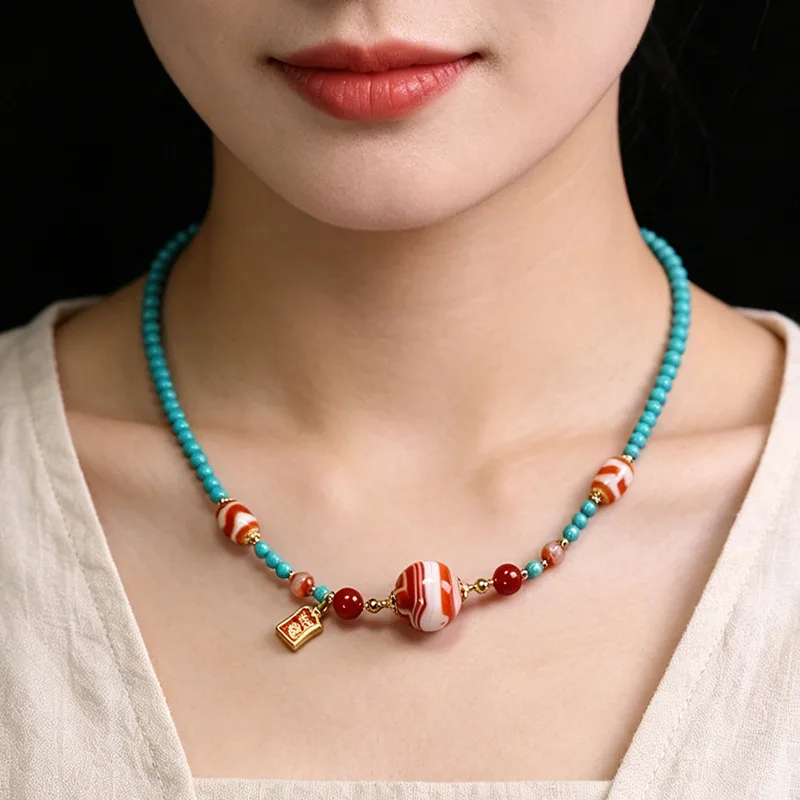 Tibetan natural authentic old raw agate red silk-threaded tiger tooth dzi bead clavicle necklace, approximately 18x18mm