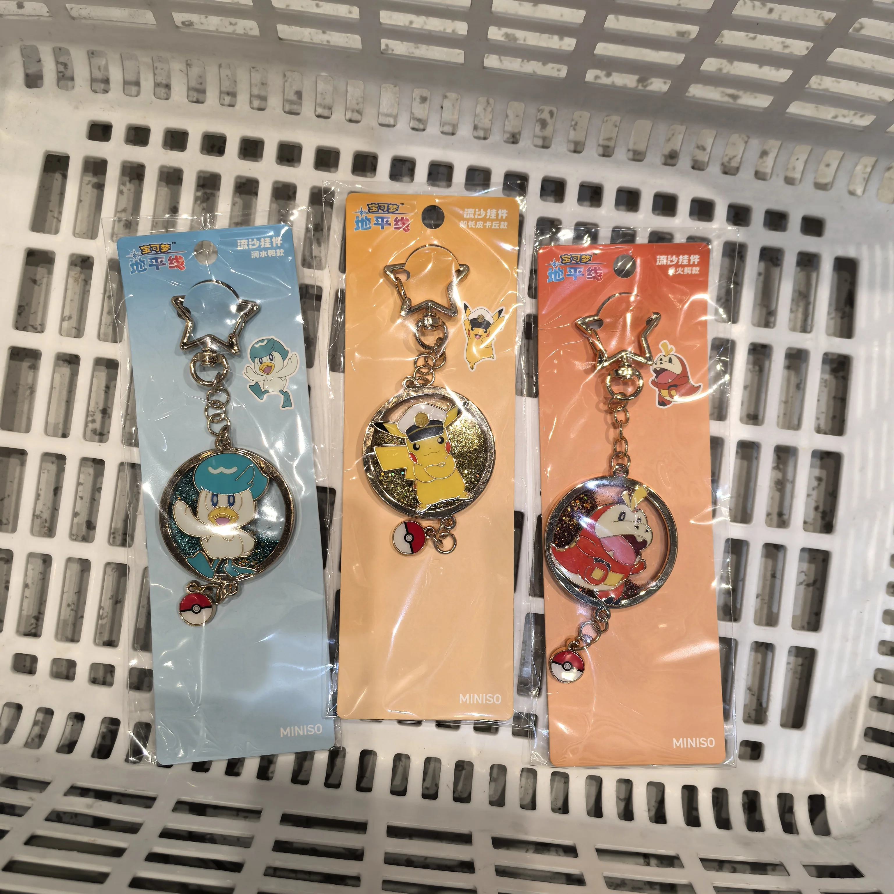 

Pokemon Horizons Series Liquid Glitter Metal Keychain Moving Sand Pendant Shiny Charm Collectible Gift for Fans