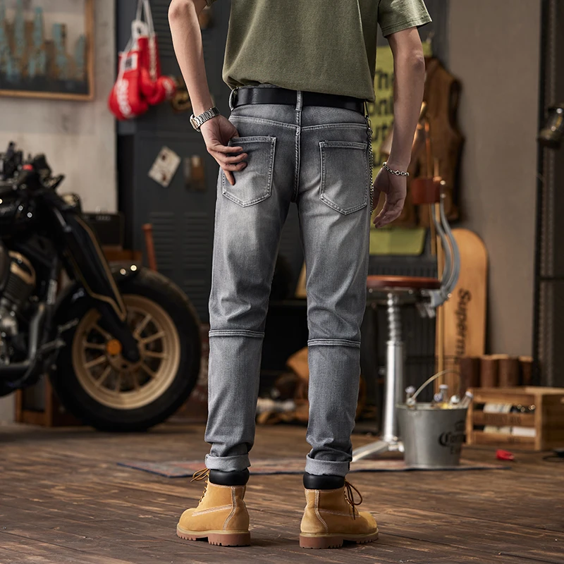 Celana Jeans sepeda motor pria, bawahan kurus sepeda motor jahitan kerajinan Keren kelas atas desain lipit