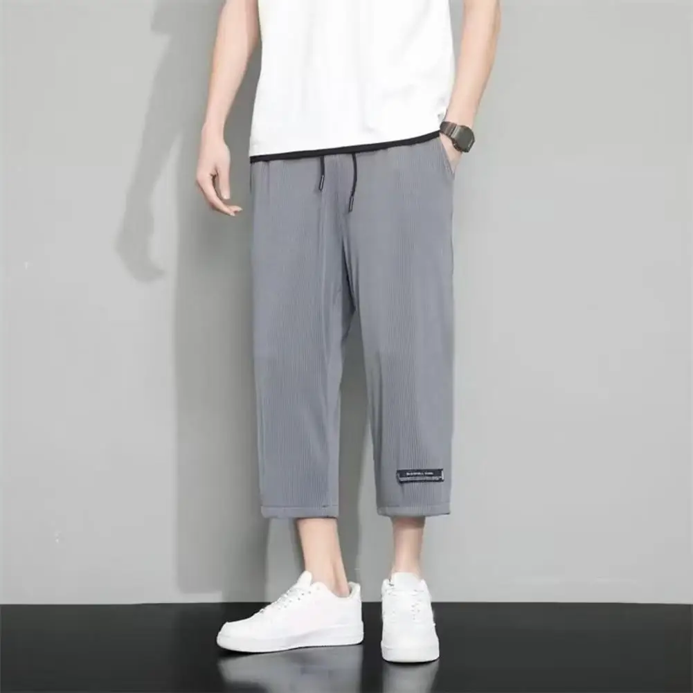 Pantaloni corti da uomo pantaloni elastici in vita con coulisse pantaloni con coulisse in seta di ghiaccio traspiranti ad asciugatura rapida con tasche per morbido