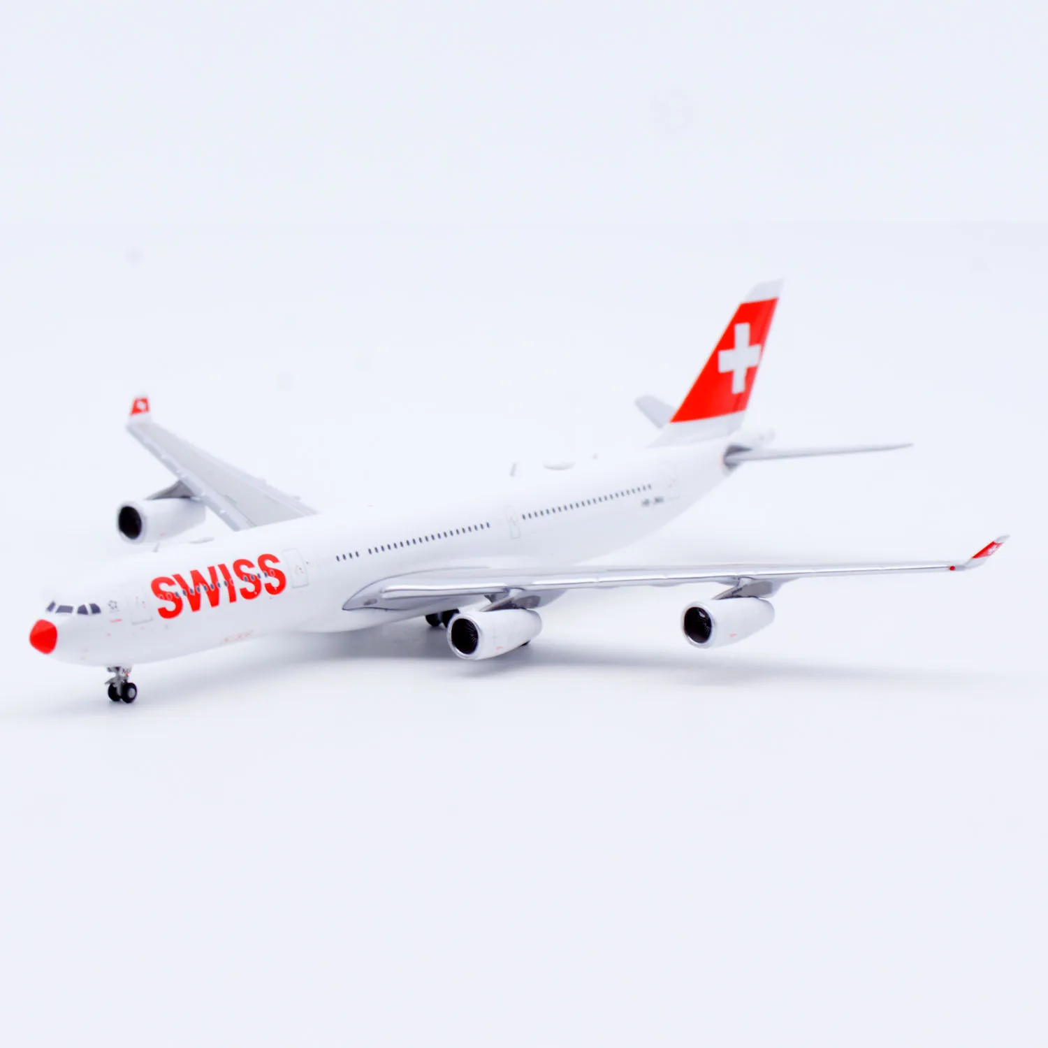XX40203 โลหะผสมสะสมเครื่องบินของขวัญ JC ปีก 1:400 Swiss "จมูกสีแดง" Airbus A340-300 เครื่องบิน Diecast Jet รุ่น HB-JMA