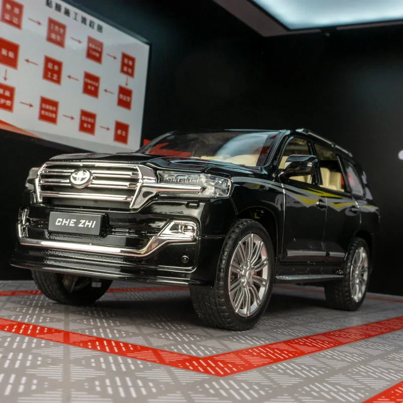 Modelo de vehículo todoterreno de aleación Toyota Land Cruiser 1:24, puertas y capó de motor, el maletero se puede abrir, juguete con amortiguador de dirección