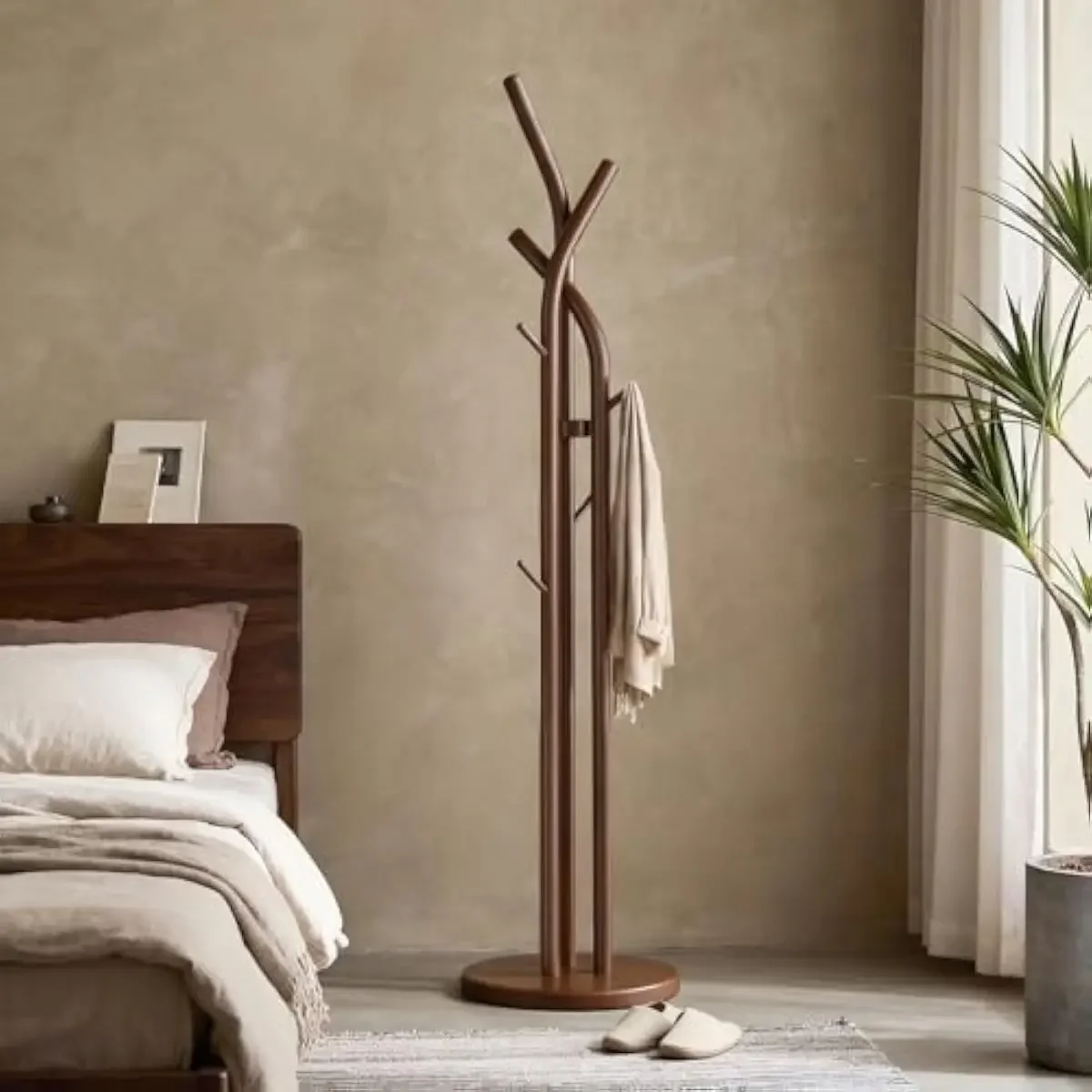 Freestanding solid rubber wood coat stand with nine durable hooks and organic tree silhouette form ideal for entryways bedrooms
