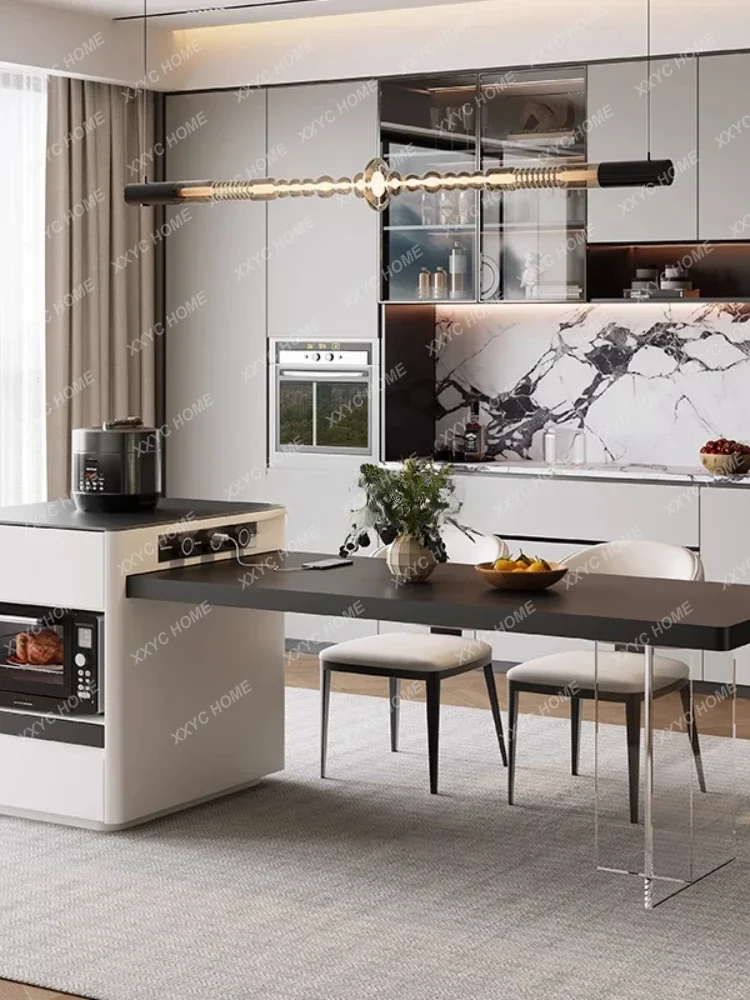 

A Rock slab island dining table integrated household retractable modern small apartment acrylic