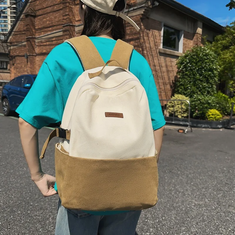 Mochila de lona Unisex para mujer, de colores mezclados morral escolar japonés, combina con todo, informal, para estudiantes universitarios, a la moda, novedad de 2023