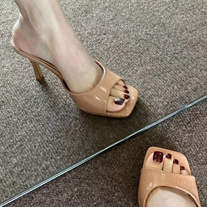 

Lacquer leather high-heeled cool slippers 2025 new summer versatile slim heel square toe exposed sexy one-piece slippers