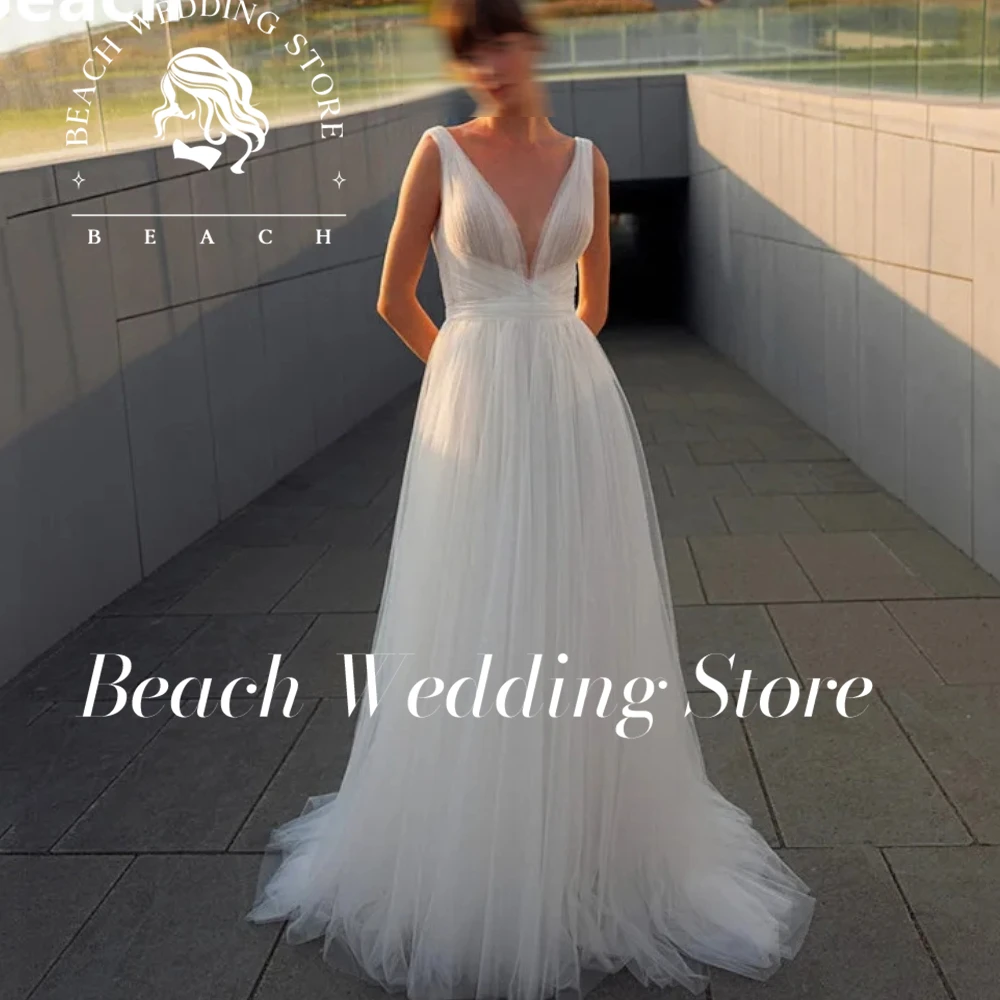 

Beach Customized And Clean V Neck Ivory Wedding Dresses A Line Sleeveless Bridal Dress Puffy Tulle Boho Wedding Gowns 2023