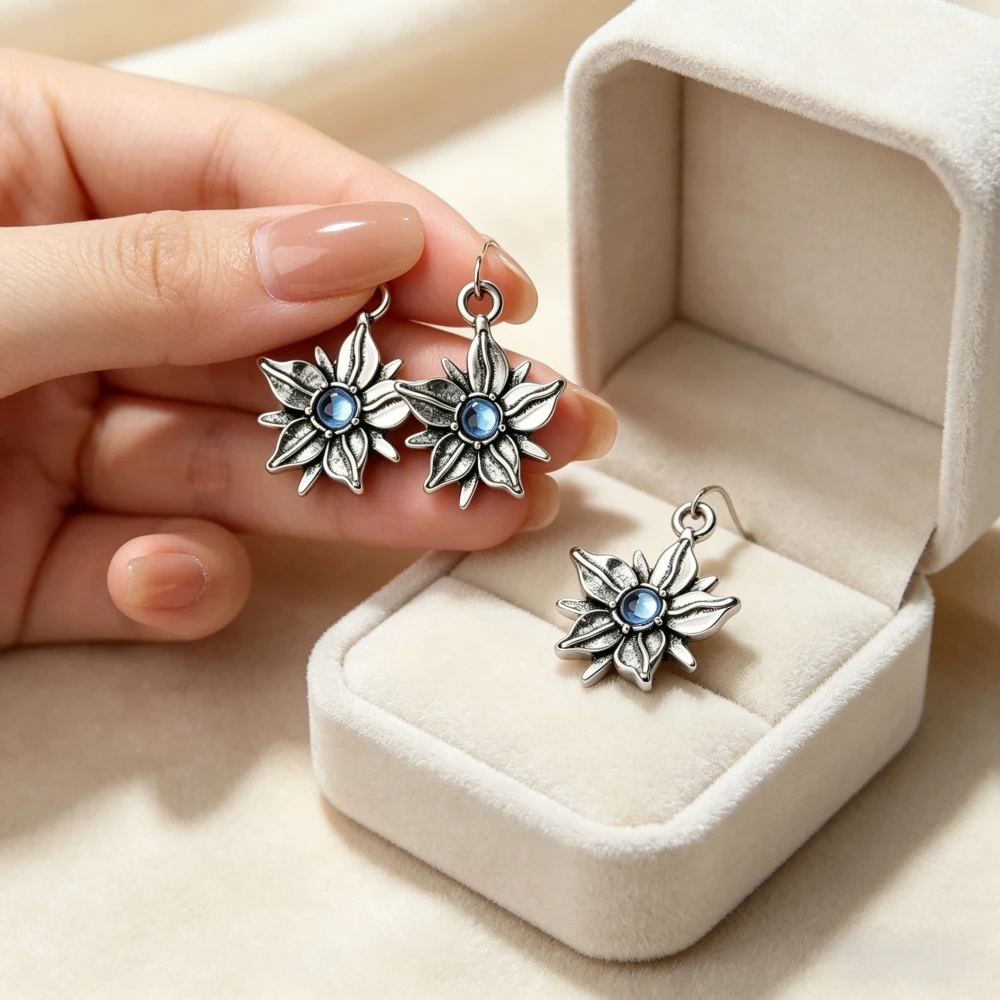Snowy flower inlaid blue zircon shaped earrings, niche ethnic controversy, West Asian style earrings, women's daily commuting, s
