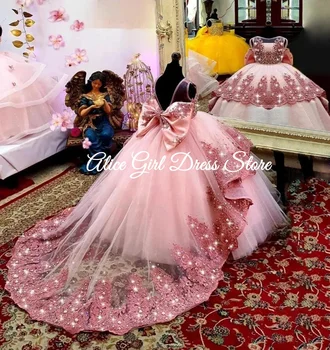 ที่กําหนดเองเจ้าหญิงดอกไม้สาวชุดสําหรับงานแต่งงานลูกไม้ประดับด้วยลูกปัดแขนกุดกับโบว์เจ้าหญิง Gowns ชุดวันเกิด